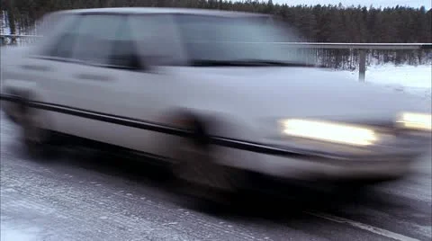 A car on a winter road Stock Footage