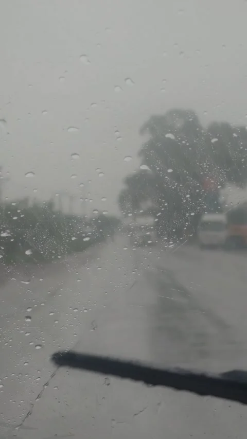 Car Wiper Cleaning Windshield In Rain - 4k Vertical Footage Stock Footage 342151571