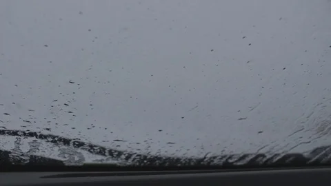 Car wipers clean windshield Stock Footage 71899337