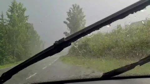 Car wipers in rain Stock Footage 221703672