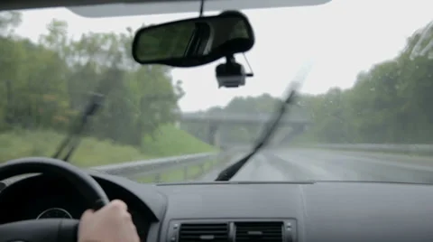 Car wipers set to the highest speed on motorway Stock Footage 32462580