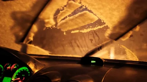 Car Wipers Sweeping Snow From The Windshield After İgnition Stock Footage 169113662