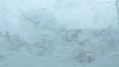 Car Wipers Wipe the Snow from the Front Window of a car as Snow Falls Stock-Footage 86552836