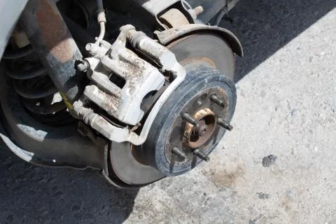 Car without wheels on the jack Stock Photos