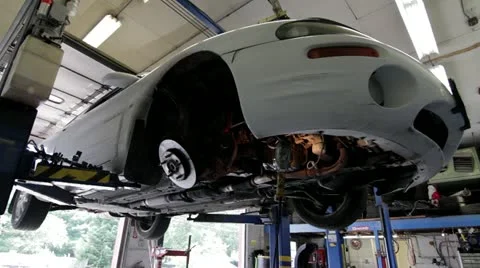 Car with work being done on it Video stock 12863653