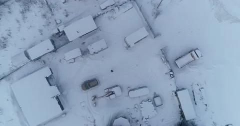 Car in the yard in winter. Top down aerial view Stock Footage 228436253