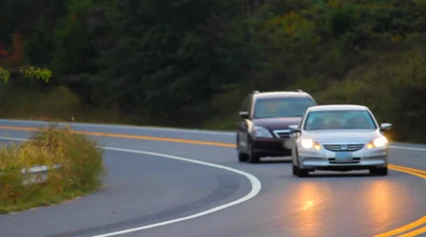 Car Yielding in Evening Stock Footage 37826536
