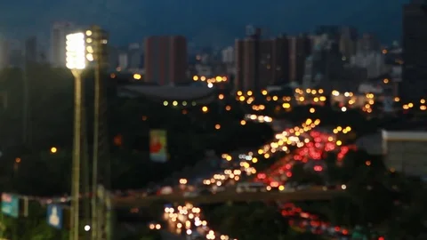 Caracas, Venezuela sunset stadium freeway rack focus Stock Footage