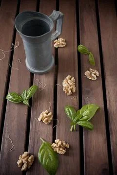 Carafe and walnuts Stock Photos