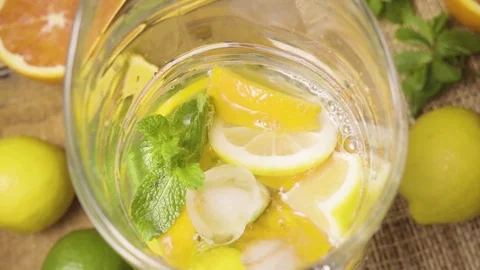Carafe with lemonade super slow mo Stock Footage 72944983