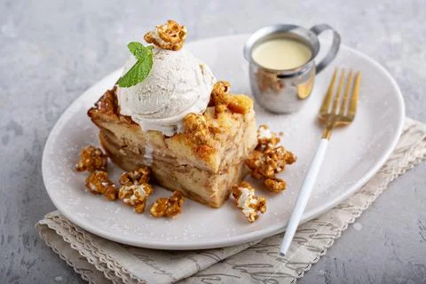 Caramel apple bread pudding with ice cream Stock Photos