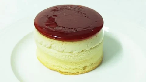Caramel custard pudding cake on a white plate. Stock Footage 345338366