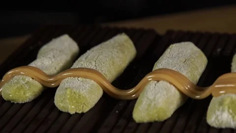 Caramel Drizzle on Matcha Pastry Stock Footage 201237041