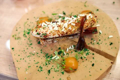 Caramel eclair with cane sugar candy Stock Photos