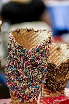 Caramel ice cream in tiny cones sweet snow cone with chocolate chips mexico Stock Photos