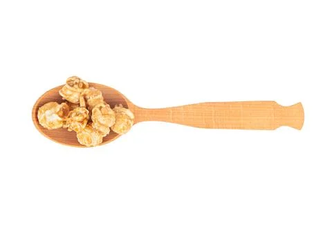 Caramel popcorn in spoon Stock Photos