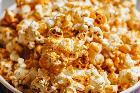 Caramel popcorn texture close-up background Stock Photos