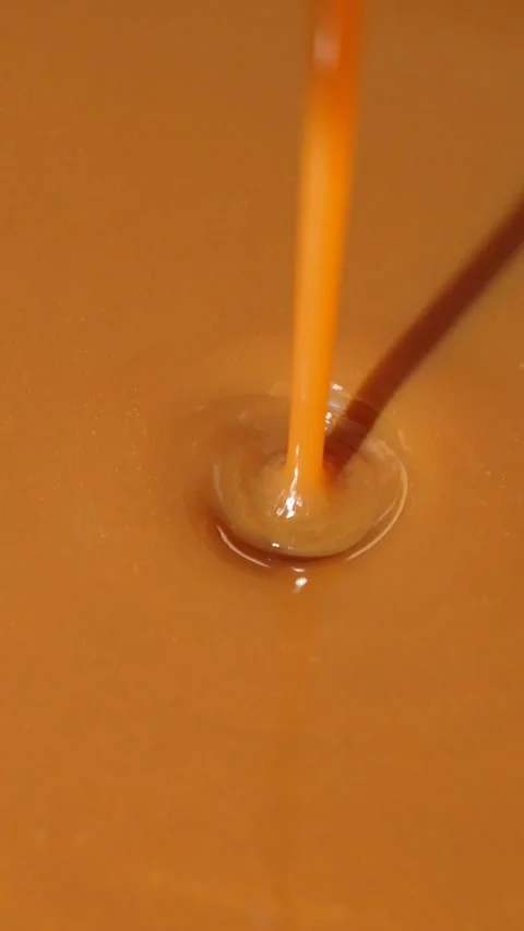 Caramel Sauce Pouring in Slow Motion, Macro Food Texture. Stock Footage 337701982