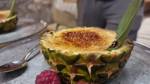Caramel Tropical Dessert in Pineapple Video stock 305798685