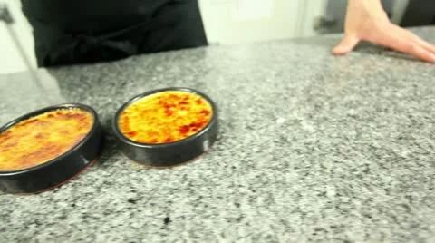 Caramelizing creme brulee glide Stock-Footage 11473553