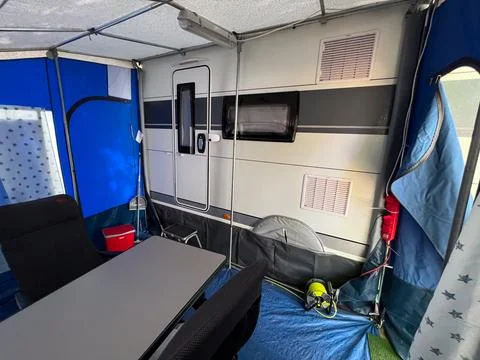 Caravan awning interior creating a comfortable camping ambiance Stock-Fotos