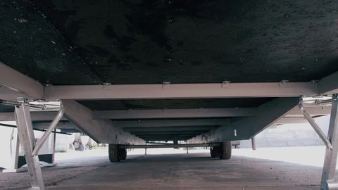 Caravan, bottom view. Wheels Caravan Stock Footage 99632152