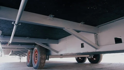 Caravan, bottom view. Wheels Caravan Stock Footage 99632325