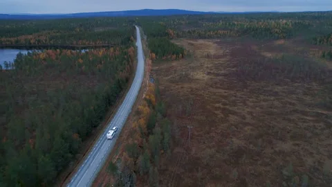Caravan Camping driving E45 Higway through wilderness of  Sweden town Lomsele Stock Footage 165850340