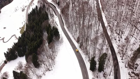 Caravan driving through alpine mountain curves Stock Footage 332134324