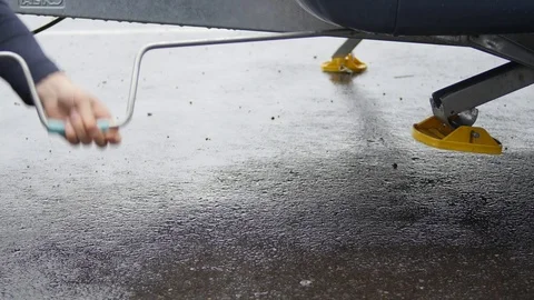 Caravan drop down stabilizing legs opening footage with audio track Stock-Footage 119232479