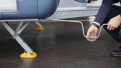 Caravan drop down stabilizing legs closing no audio Stock-Footage 119232596