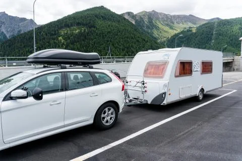 Caravan pulled from a car for holiday Stock Photos