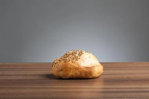 Caraway bread roll on a table Stock Photos