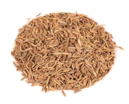 Caraway seeds isolated on white background. Pile of cumin or caraway spice. Stock Photos