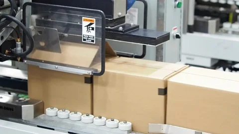 Carboard boxes. Folded by machine in plant B Stock Footage 102185331