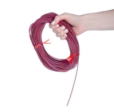 Carbon cable underfloor heating in hand Stock Photos