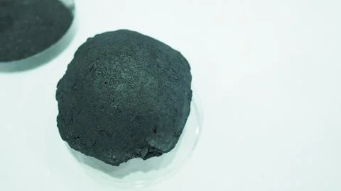 Carbon electrode paste in egg shape Stock Photos