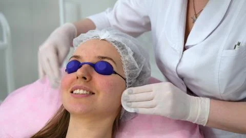 Carbon face peeling procedure. Stock Photos