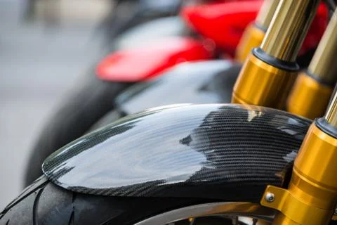 Carbon fiber motorbike closeup Stock Photos