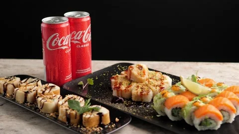 Carbonated drink Coca Cola. bubbles. red jar.  sushi. delicious complex Stock Footage 171985758