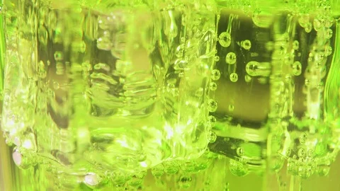 Carbonated drink in a glass with ice close-up Stock Footage 91977247