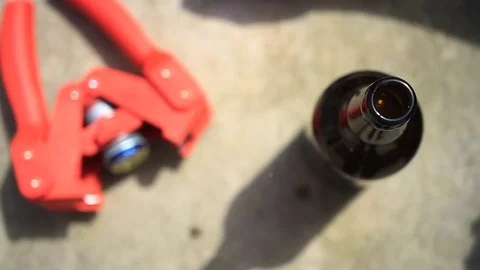 Carbonating and capping home brew cider Stock Footage 75070657