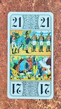 Card called "bout" in a tarot deck. Card 21 close-up. Stock Photos