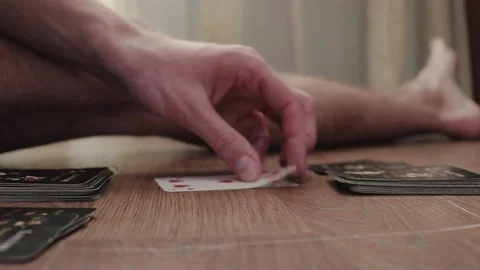Card game on the floor Video stock 130205250