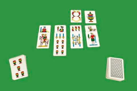 Card game with neapolitan cards. Stock Photos