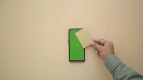 Card payment process on smartphone screen at home Stock Footage 322208662