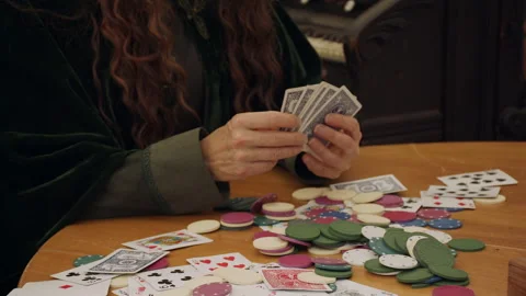 Card players hands at card table in gold rush heritage site, 4k Stock-Footage 222242337