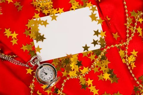 Card on a red background with clock Stock Photos
