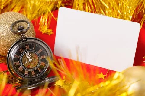 Card on a red background with clock Stock Photos