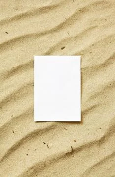 Card on sand Stock Photos
